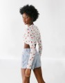 asos-design-tie-front-cherry-print-crop-top-in-white__2_-removebg-preview.jpg