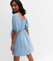 maternity-pale-blue-denim-shirred-puff-sleeve-mini-dress (3).jpg