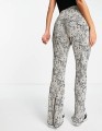 Topshop – Plisowane spodnie dzwony w cętki_ 2_yythk.jpg