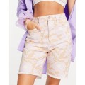 reclaimed-vintage-inspired-the-long-line-dad-denim-short-in-retro-floral-print (1).jpg