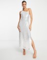 zemeta-high-rise-cut-out-flared-pants-in-cream-with-tie-waist (1).jpg