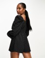 in-the-style-petite-volume-sleeve-playsuit-in-black-spot-print (1).jpg