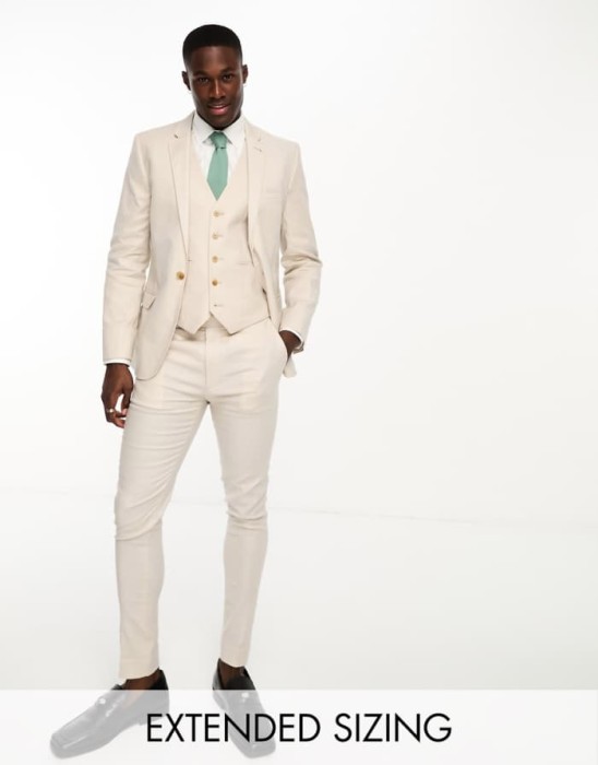 Jasnobeżowe spodnie rurki zamek (30/32)