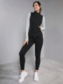 Czarna kamizelka zamki (2XL)