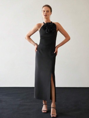 Czarna sukienka rozcięcie (L)