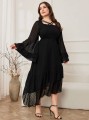 Czarna asymetryczna sukienka (2XL)