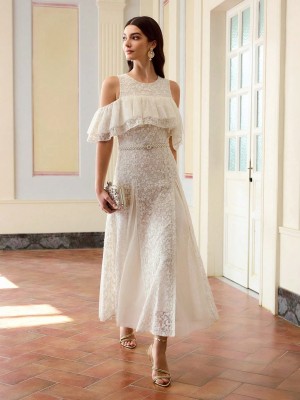 Koronkowa sukienka midi falbana (L)