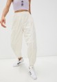 Logowane spodnie ecru H06695 (40)