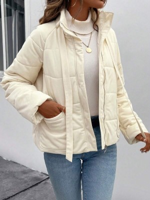 Puchowa kurtka ecru kieszenie (L)