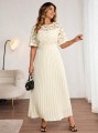 Plisowana sukienka ecru (4XL)