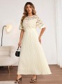 Plisowana sukienka ecru (4XL)