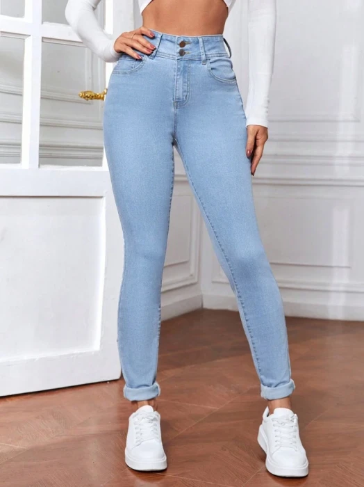Jasnoniebieskie jeansy rurki (S)