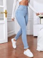 Jasnoniebieskie jeansy rurki (S)