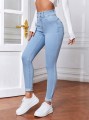 Jasnoniebieskie jeansy rurki (S)