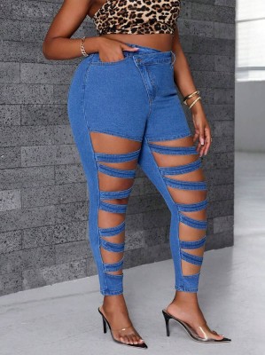 Niebieskie jeansy rurki cut out (2XL)