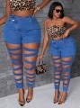 Niebieskie jeansy rurki cut out (2XL)