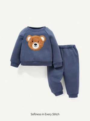 Granatowy komplet spodnie bluza (2-3L)