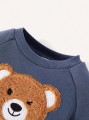 Granatowy komplet spodnie bluza (2-3L)