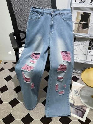 Jasnoniebieskie jeansy dziury (14L)