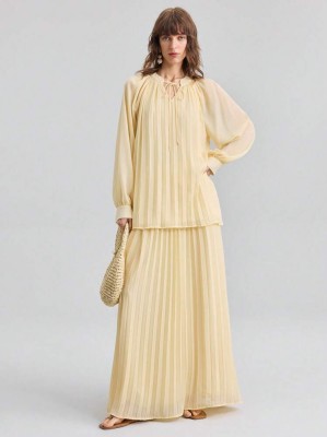 Żółta plisowana bluzka (M)