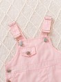 Jasnoróżowy kombinezon kieszenie (9-12M)