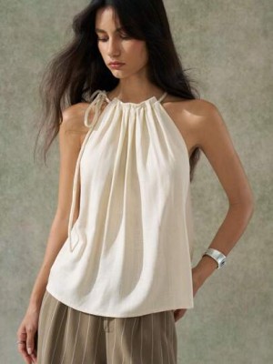 Beżowa bluzka bez rękawów wiązanie (M)