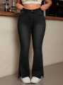 Czarne jeansowe dzwony rozcięcia (0XL)