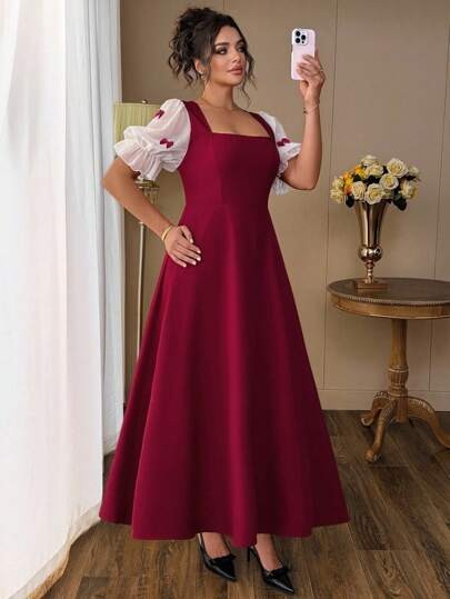 Czerwona sukienka midi kokardki (1XL)