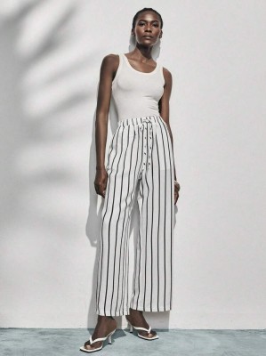 Białe proste spodnie paski (S)