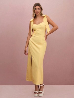 Żółta sukienka rozcięcie (L)