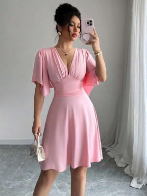 Jasnoróżowa sukienka v neck (1XL)