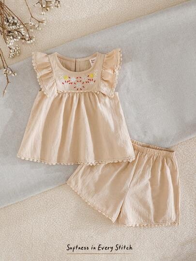 Beżowy zestaw szorty bluzka (18-24M)