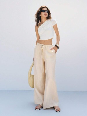 Beżowe proste spodnie (M)