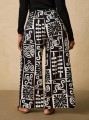 Wzorzyste czarno białe spodnie (2XL)