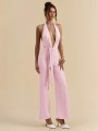 Jasnoróżowy kombinezon open back (XS)