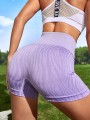Fioletowe krótkie legginsy wzór (M)