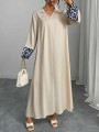 Beżowa sukienka maxi kieszeń (2XL)