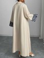 Beżowa sukienka maxi kieszeń (2XL)