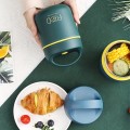 Zielony pojemnik na lunch łyżeczka