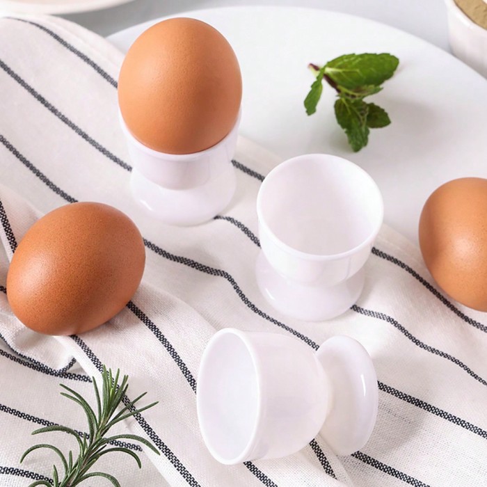 Biała plastikowa podstawka pod jajko