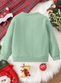 Zielona świąteczna bluza nadruk (6-9M)
