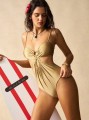 Beżowy strój jednoczęściowy cut out (XL)