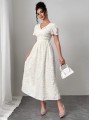 Elegancka sukienka ecru (L)