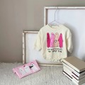 Żółte body nadruk (12-18M)