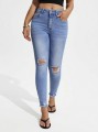 Niebieskie jeansy rurki dziury (M)