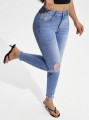 Niebieskie jeansy rurki dziury (M)