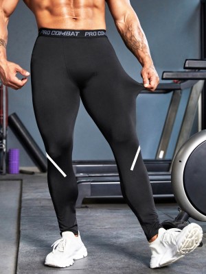 Czarne legginsy nadruk (M)