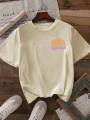 Beżowy luźny t-shirt nadruk (S)