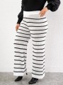Białe dzianinowe spodnie paski (3XL)