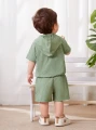 Oliwkowy komplet szorty koszulka (6-9M)